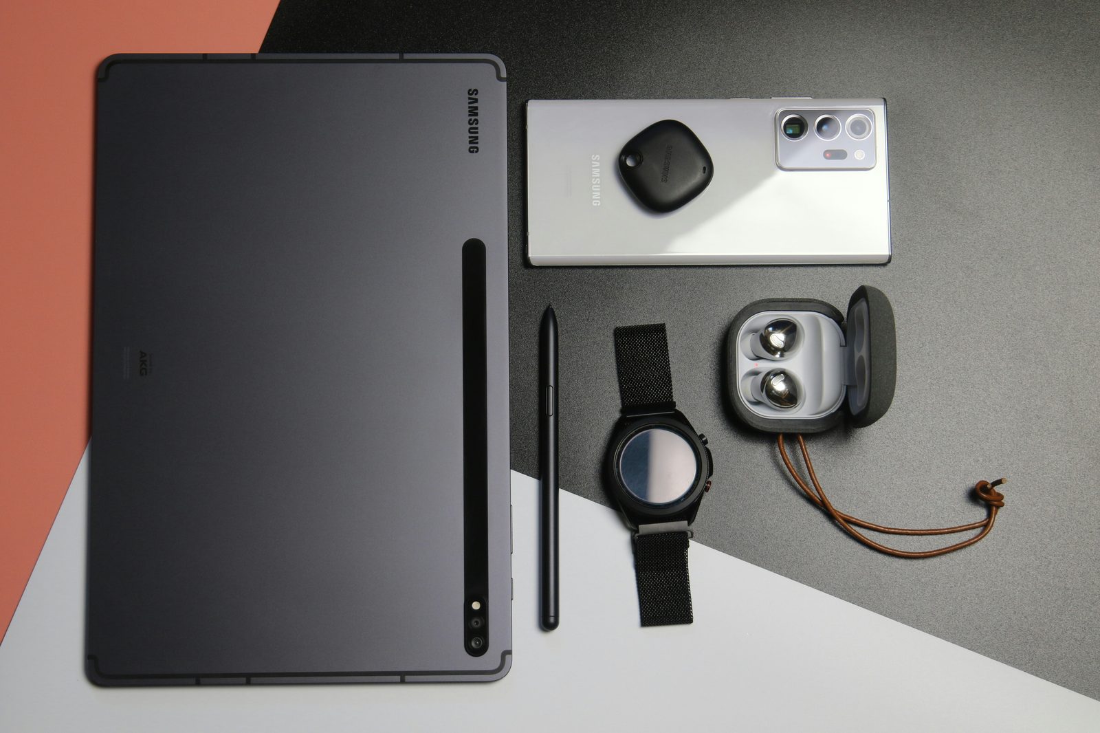 Samsung tablet, phone, watch and earbuds flat lay